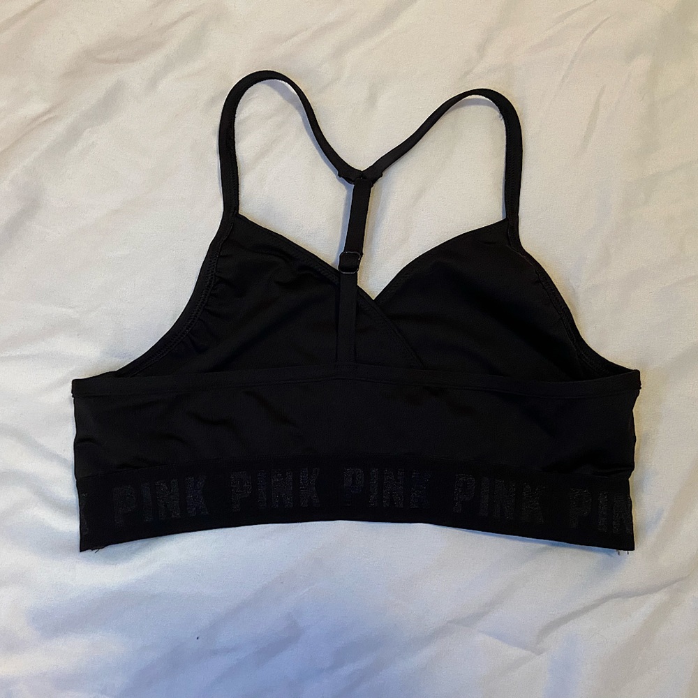 PINK SWIM TOP IN BLACK! GREAT CONDITION WOMENS SIZE SMALL!